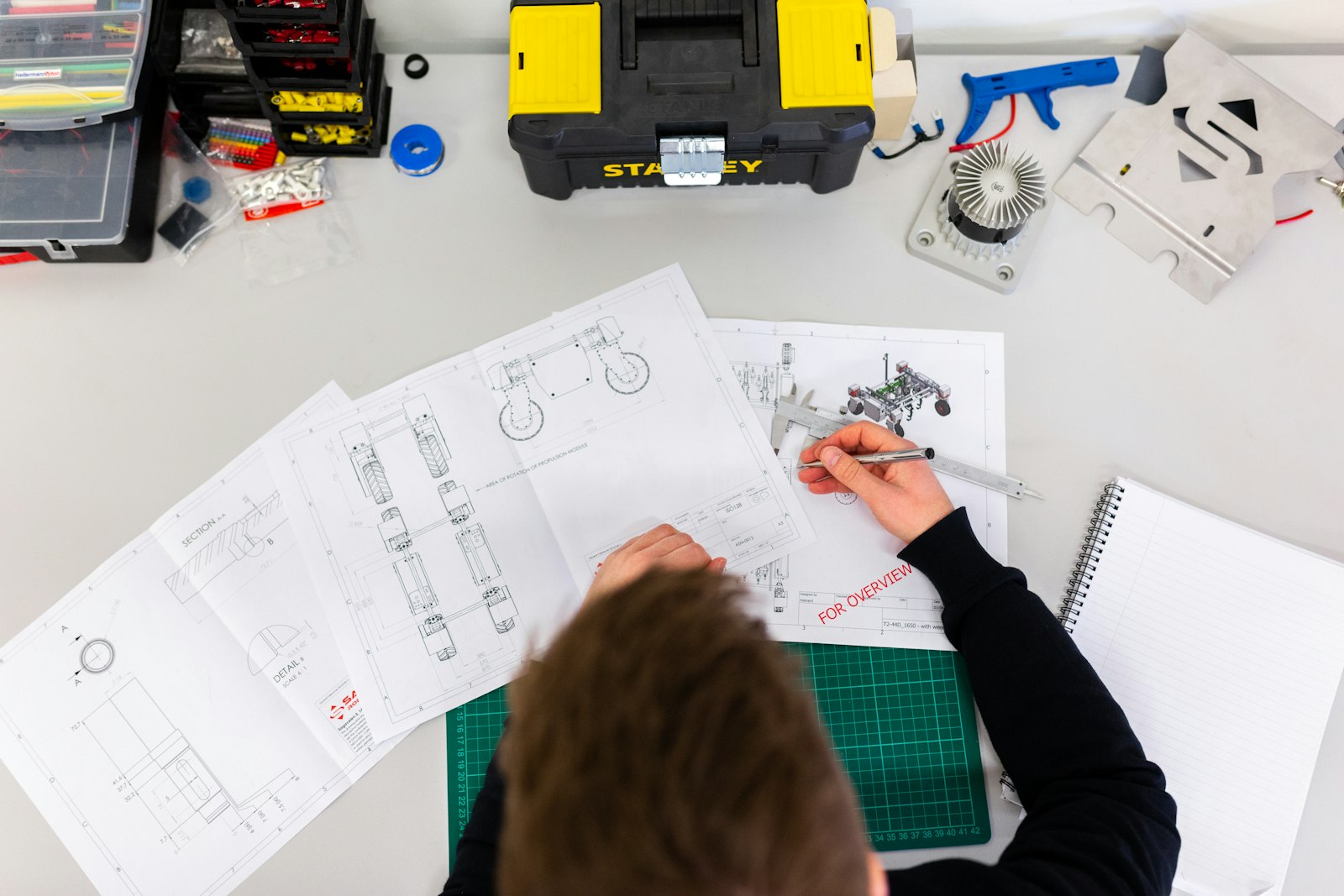 Engineers reviewing production equipment on site